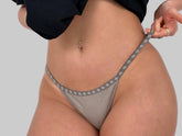 This image features an intimate apparel item known as "Number 2 in Rain Cloud," which is a minimalist-style G-string. The G-string is crafted from 100% cotton, emphasizing comfort and breathability.